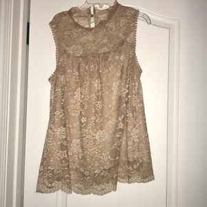 Cream sleeveless blouse